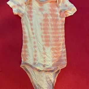 Kyte Baby Bodysuit in Crepe Rip Tide 6-12 months